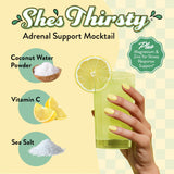 Pouring Legendairy Milk She's Thirsty Lemon-Lime mix into a glass of water