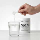Powders NMN Sublingual Powder on a wooden table