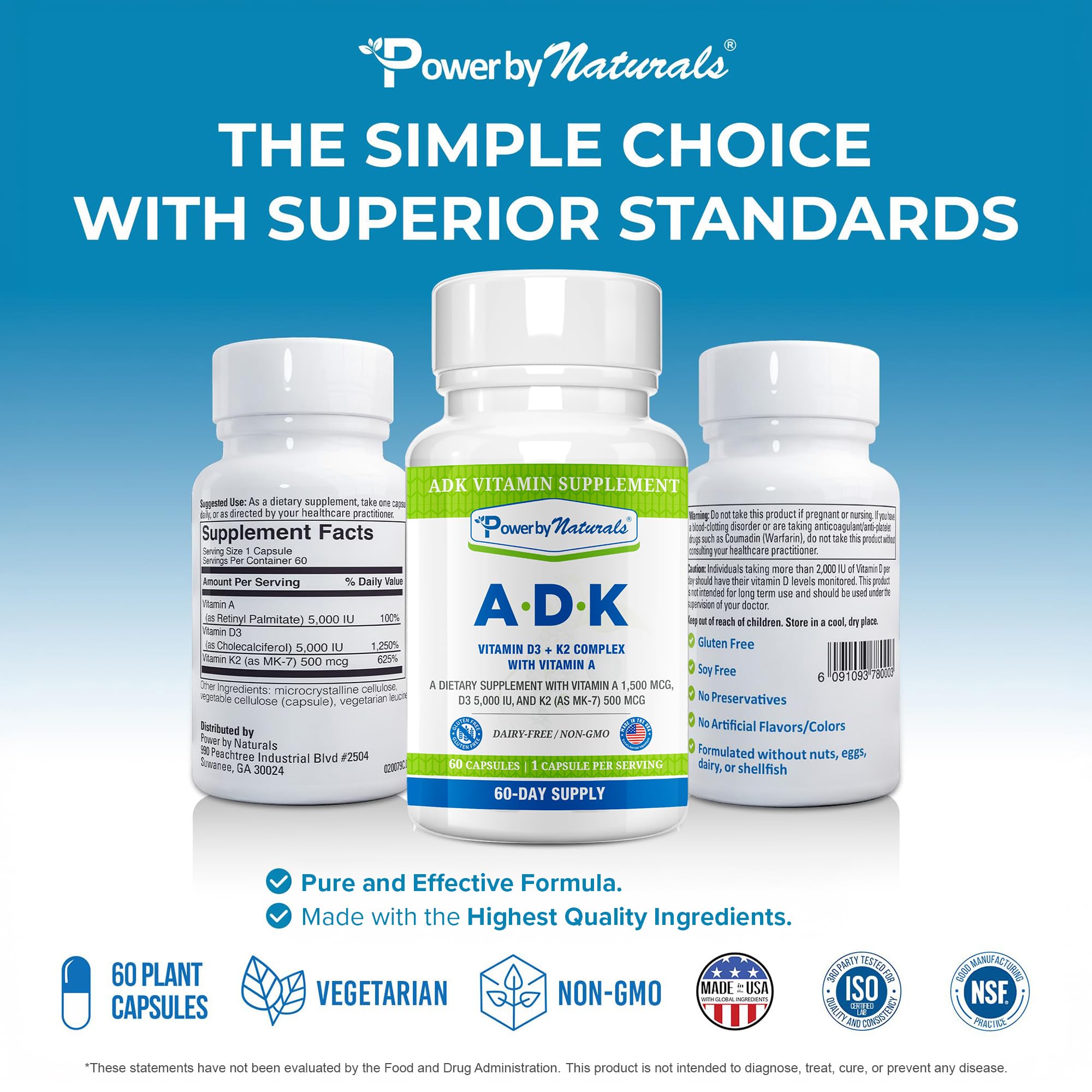 Power By Naturals ADK Supplement capsule on a wooden surface