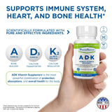 Power By Naturals ADK Supplement displayed with other vitamins