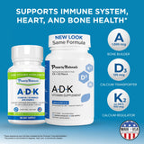 Power By Naturals ADK Supplement lifestyle scene with a glass of water