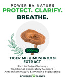 POWERED X PLANTS Tiger Milk Mushroom Capsules on a wooden table