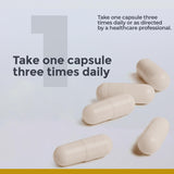 Premier Research Labs Colostrum Capsules on a wooden table