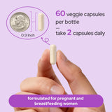 Premom Prenatal Choline capsules in a hand
