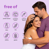 Premom Prenatal Vitamins capsules in a hand, showcasing size
