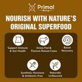 Primal Being Grassfed Colostrum Powder 126g in a glass of water
