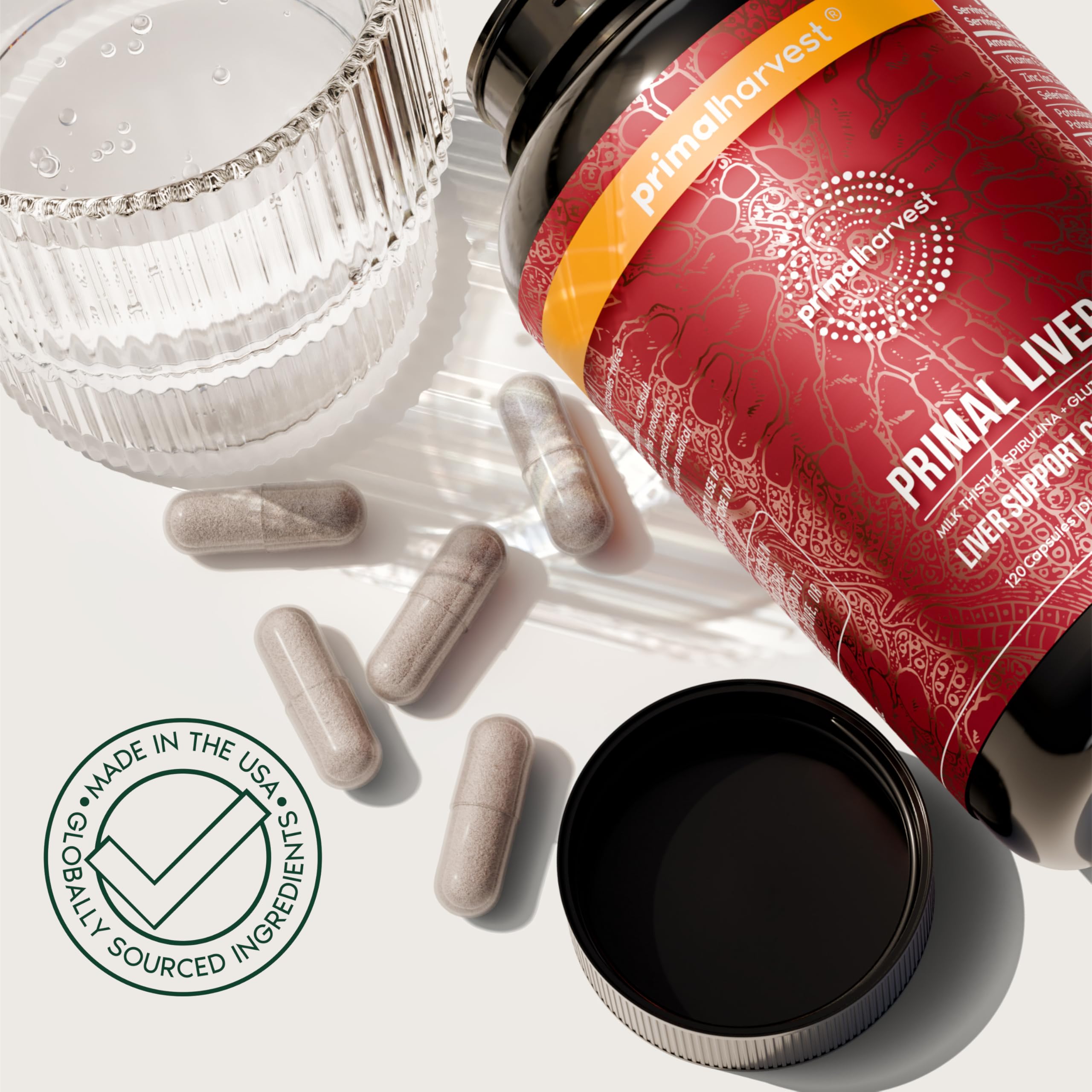 Primal Harvest Liver Support Capsules with a glass of water