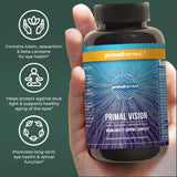 Primal Harvest Primal Vision Lutein capsules on a wooden table