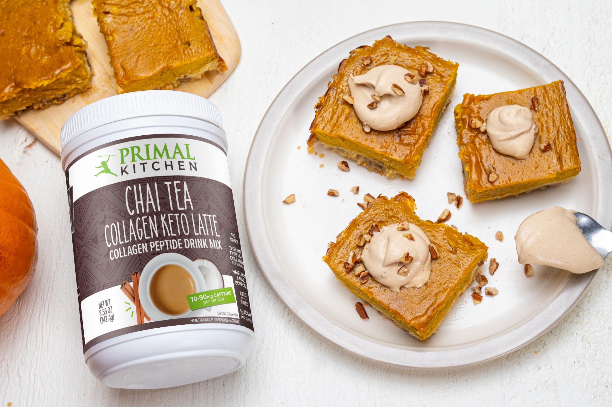 Primal Kitchen Chai Tea Collagen Keto Latte 255g mixed in a cup