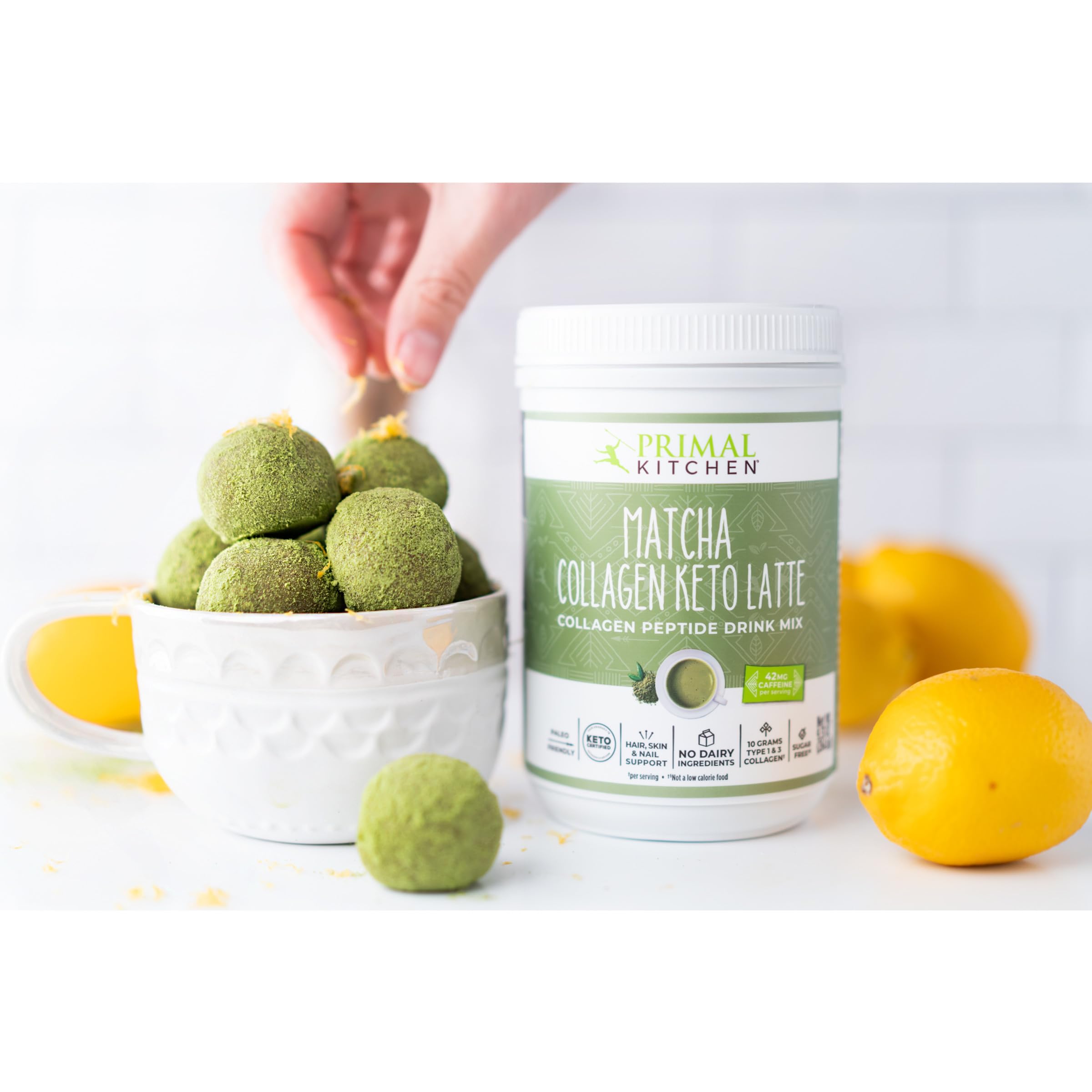 Primal Kitchen Collagen Keto Latte Matcha 272g powder mixed in a cup
