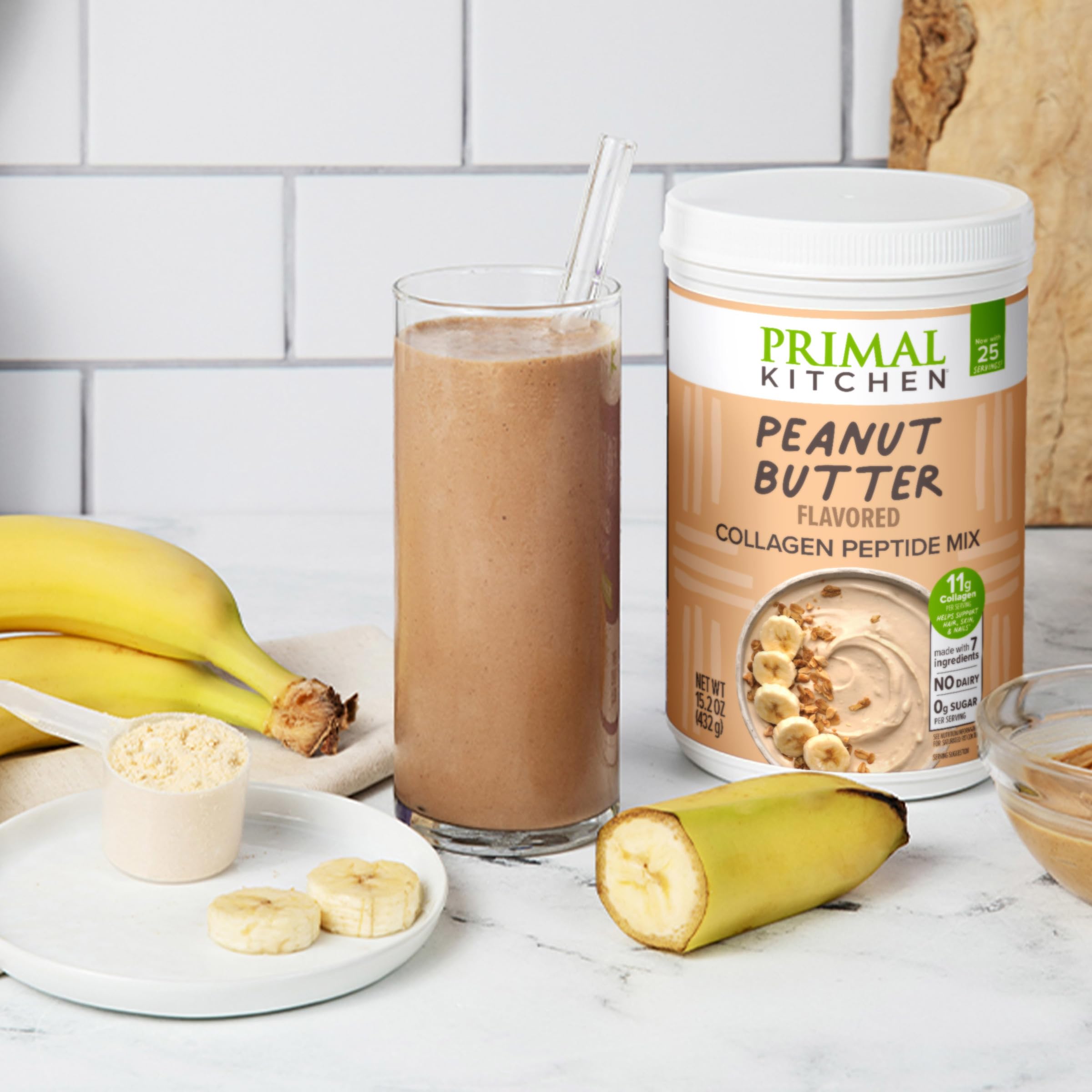 Primal Kitchen Peanut Butter Collagen Drink Mix in a glass