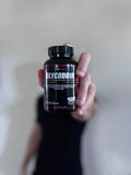 PROCCOR Blended Vitamin & Mineral Supplement with a measuring spoon