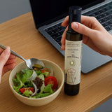 Prof Saracoglu Flaxseed Oil 250g poured into a spoon