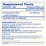 ProHealth TMG Supplement on a wooden table