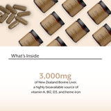 ProMix Nutrition Raw Liver Capsules displayed on a wooden table