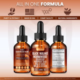Purafina Wormwood Black Walnut Clove Liquid Drops and a glass of water