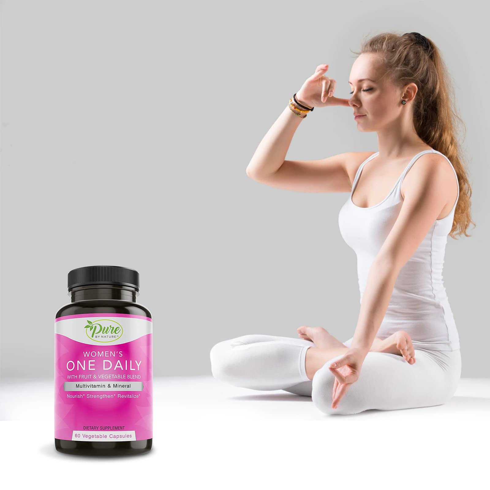 Pure By Nature Multivitamins displayed with a glass of water