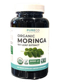 PURE CO Moringa Capsules displayed with other supplements