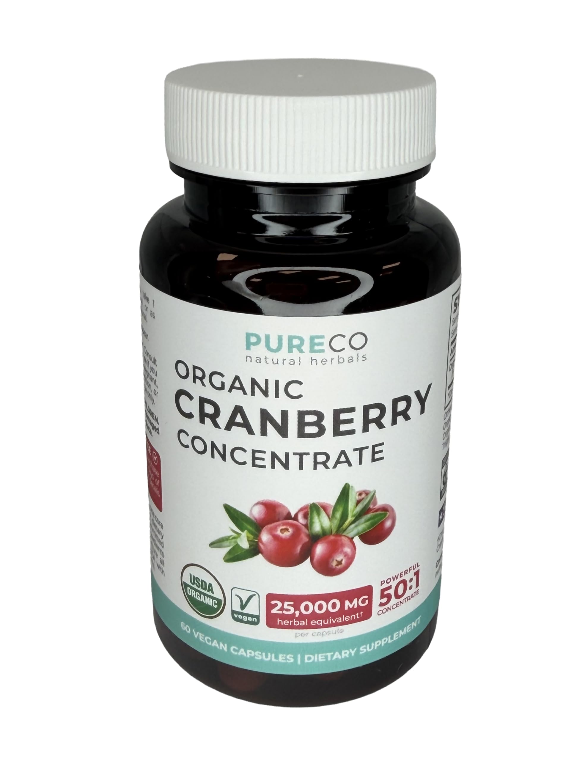 PURE CO Organic Cranberry Concentrate bottle with a plant background