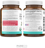 PURE CO Organic Cranberry Concentrate capsules in a hand