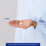 Pure Encapsulations Calcium Magnesium Supplement capsules on a surface