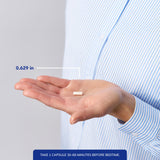 Pure Encapsulations Melatonin-SR capsules on a wooden table