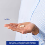 Pure Encapsulations Strontium Citrate 227mg capsules on a wooden table