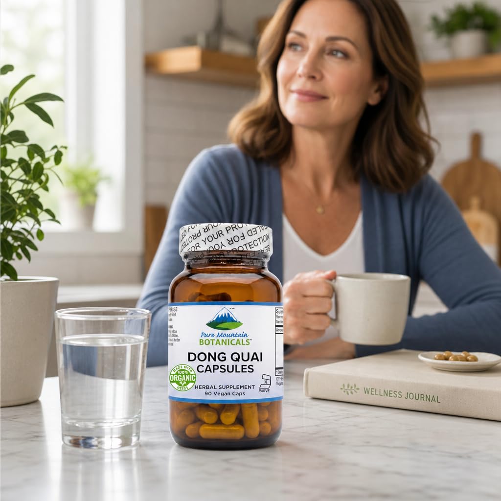 Pure Mountain Botanicals Dong Quai 500mg capsules on a wooden surface