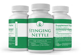 PURE ORIGINAL INGREDIENTS Stinging Nettle Capsules on a wooden surface