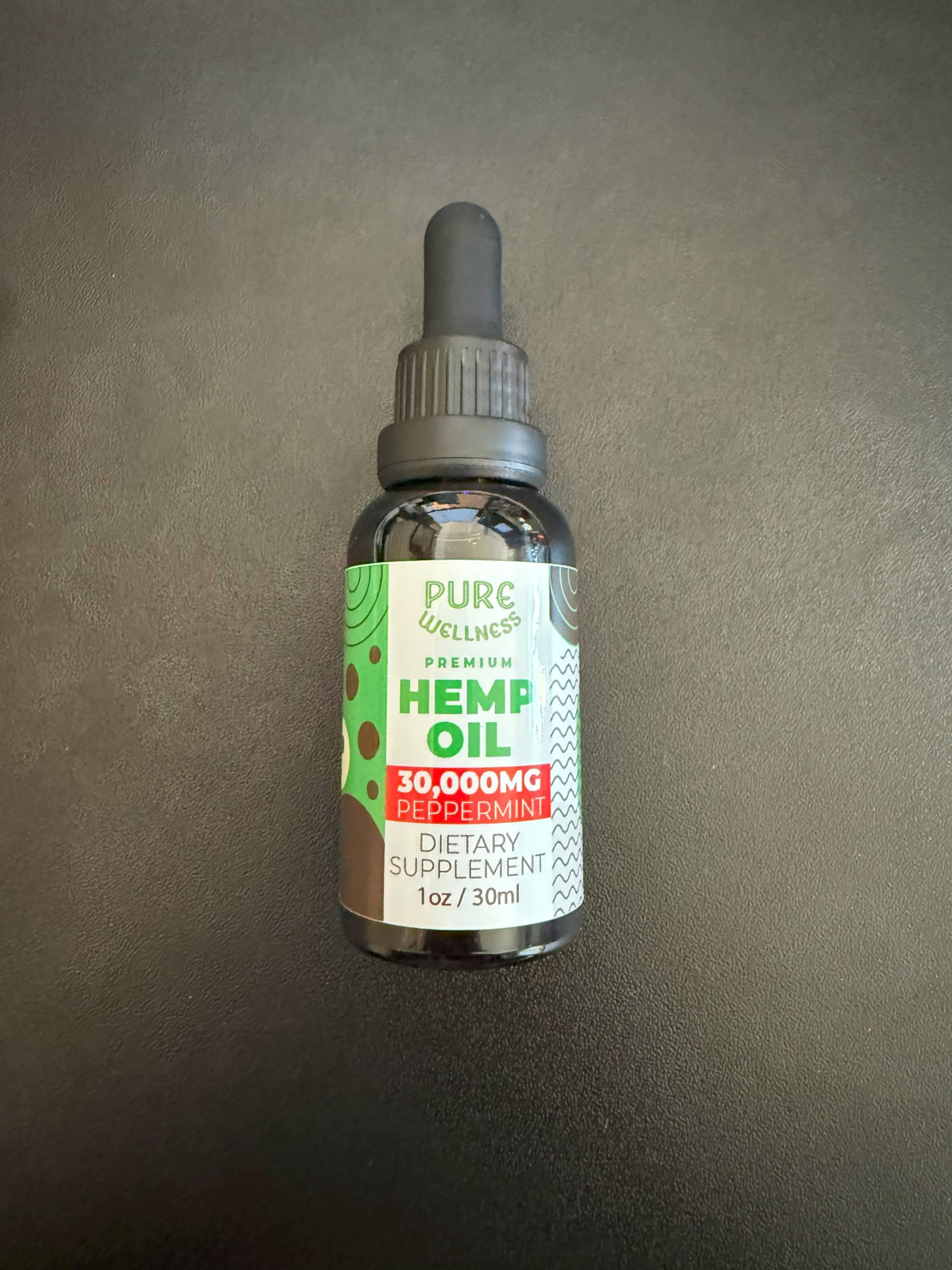 Pure Wellness Organic Hemp Seed Oil 30,000mg close-up of bottle