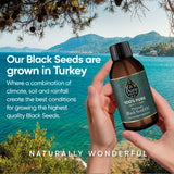 Pure World Black Seed Oil 100g side view with label