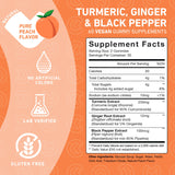 PUREFINITY Turmeric Ginger Gummies in a hand for size comparison