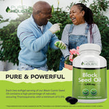 Purely Holistic Black Seed Oil softgels on a wooden surface