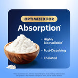 Purely Holistic Magnesium Glycinate 400mg tablets in a hand