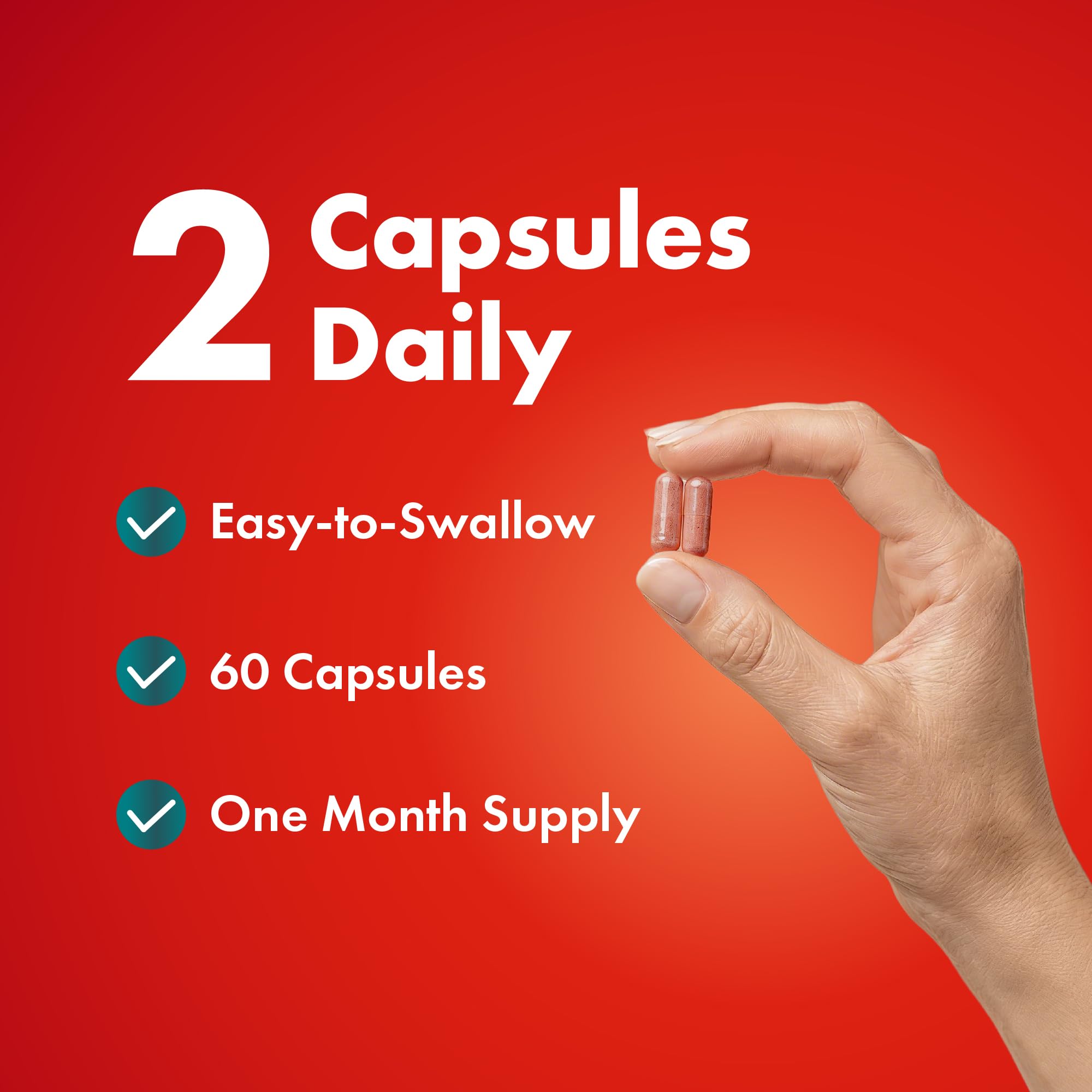 Purely Holistic Red Yeast Rice + CoQ10 capsules in a hand