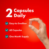 Purely Holistic Red Yeast Rice + CoQ10 capsules in a hand