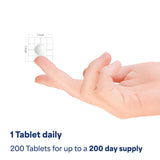 Puritan's Pride Youth Guard DHEA 50mg tablets on a wooden surface