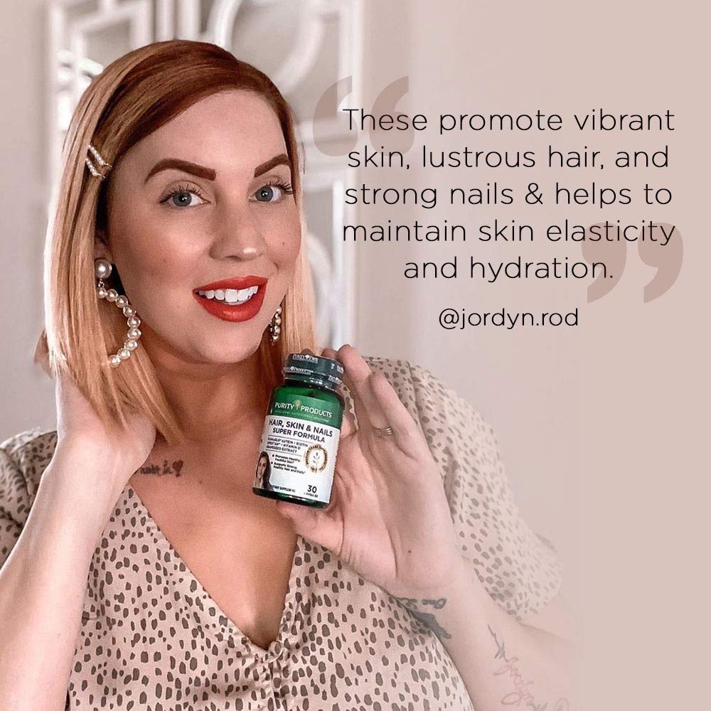 Purity Products Hair, Skin & Nails Super Formula on a wooden table