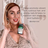 Purity Products Hair, Skin & Nails Super Formula on a wooden table