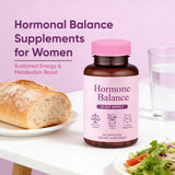 Qiuumey Women's Health Supplement capsule in hand