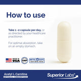 quality Labs Acetyl L-Carnitine 500mg capsules on a wooden table