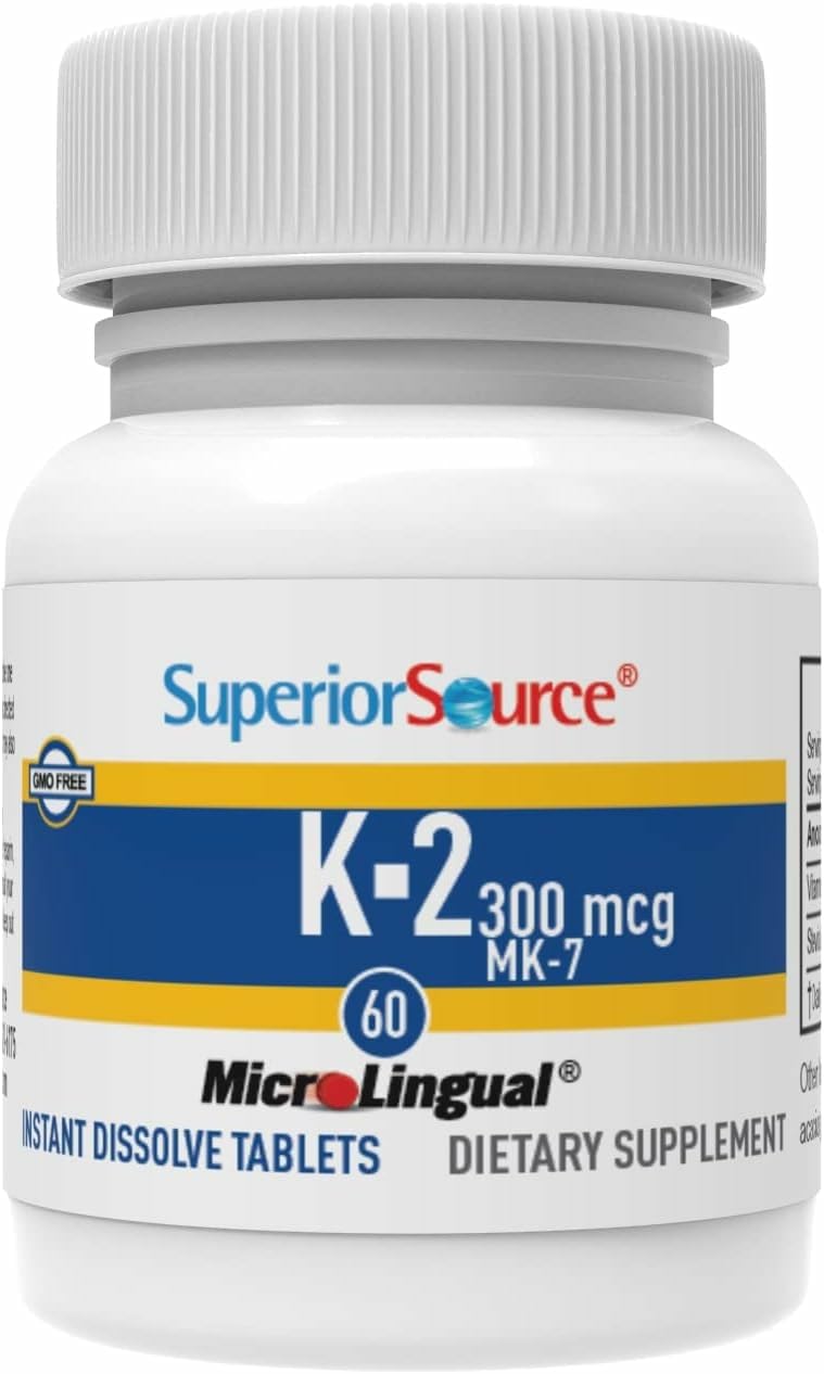 quality Source Vitamin K2 MK-7 tablets on a wooden surface
