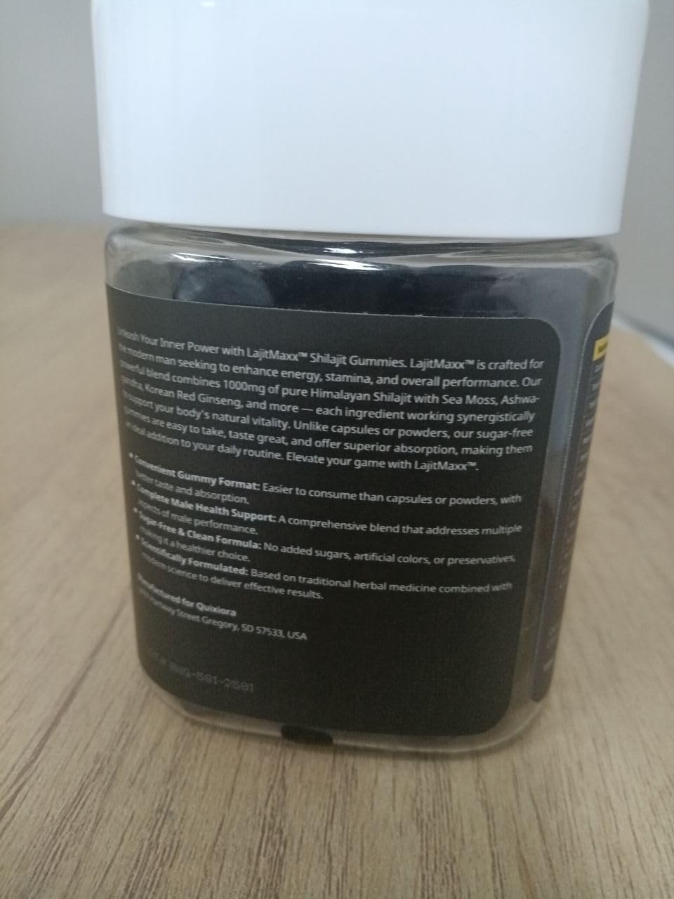 Quixiora Shilajit Gummies lifestyle scene with health products