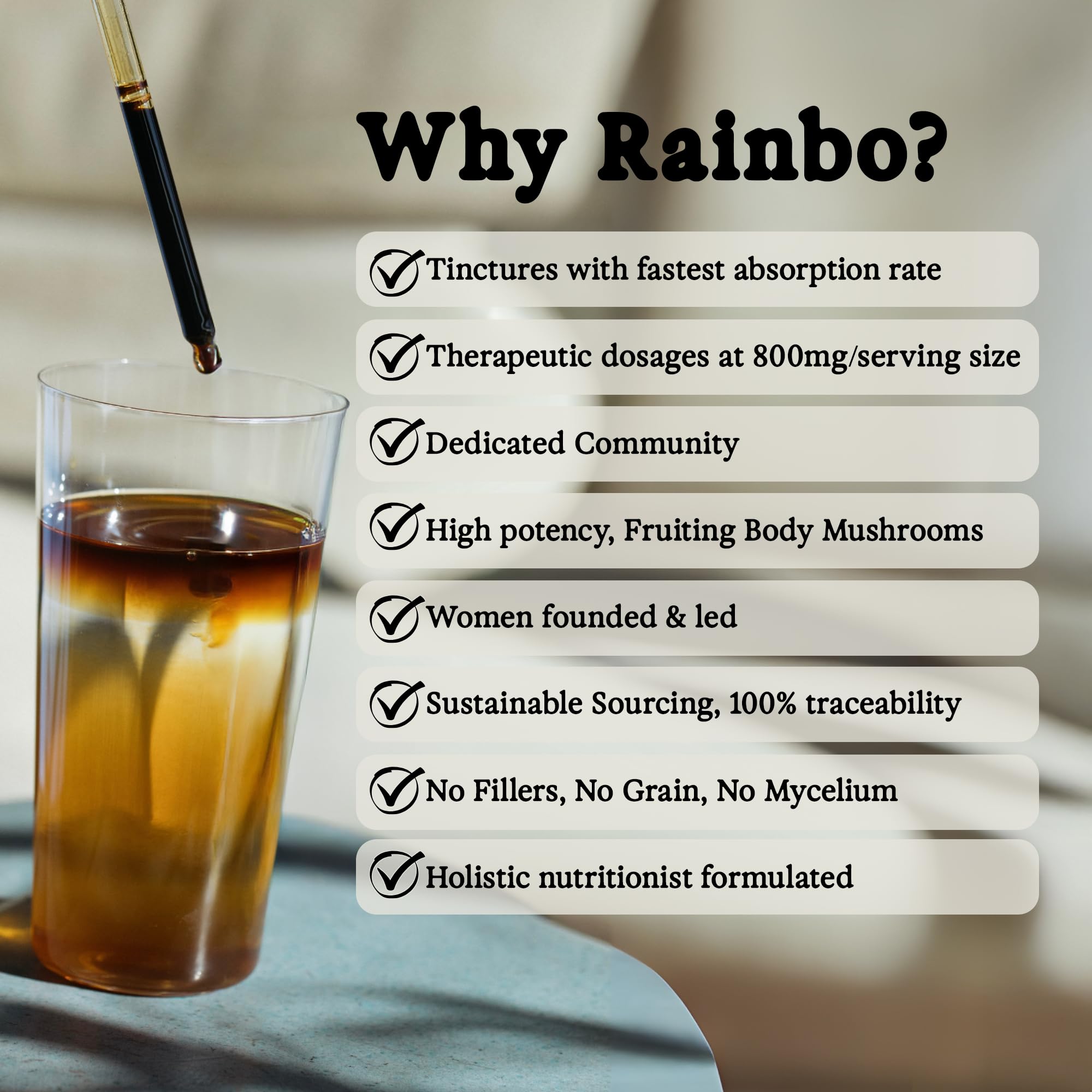 Rainbo Lion's Mane Mushroom Liquid Tincture in a glass of water