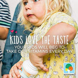 Raise Them Well Chewable Multivitamins for Kids with a spoon