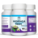 Raiz DE Moringa and Neem capsules in a natural setting