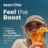 REACTONZ daily wellness Plus effervescent drink in a glass