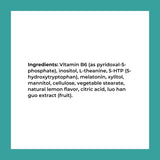 Reignite Wellness Sleep Supplement Tablets on a wooden table
