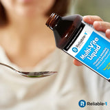 Reliable-1 Laboratories Liquid Multi-Vite in a glass with citrus slices
