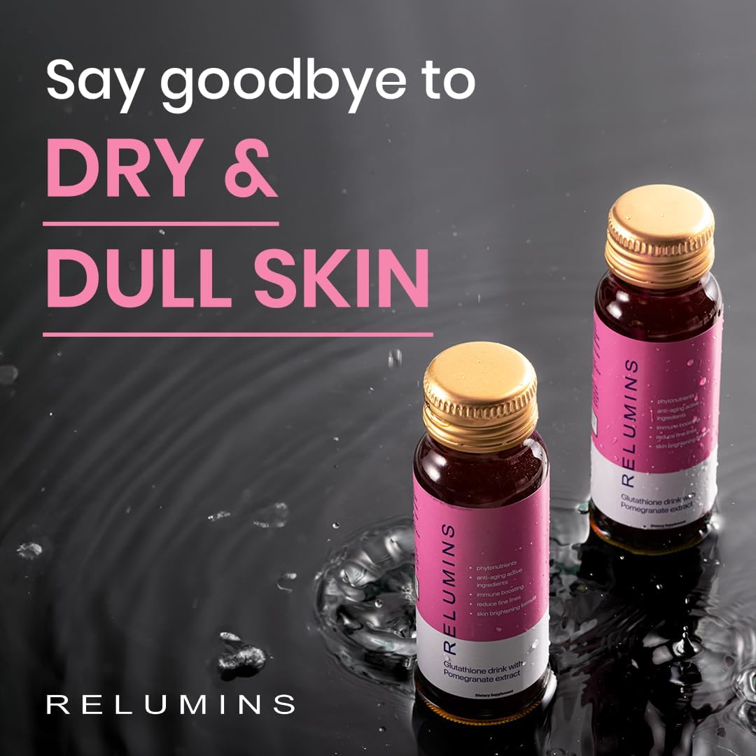Relumins Hydration Shots on a wooden table with fresh pomegranates